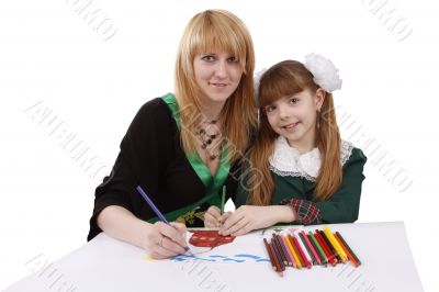 Mother and daughter is drawing the picture.