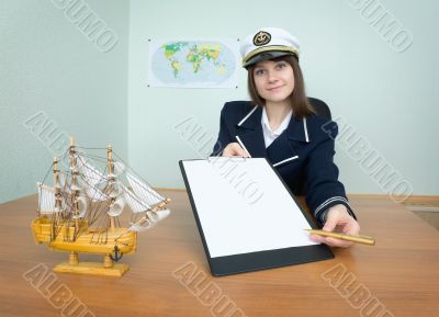 Girl - sea captain with a tablet and pen