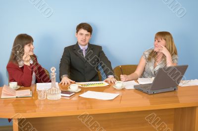 Business team sits at the table Business team sits at the table