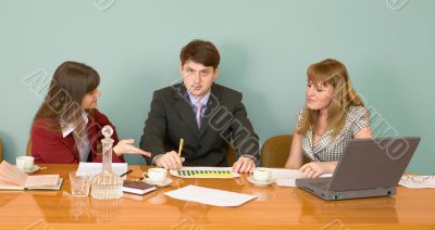 Business team sits at the table Business team sits at the table