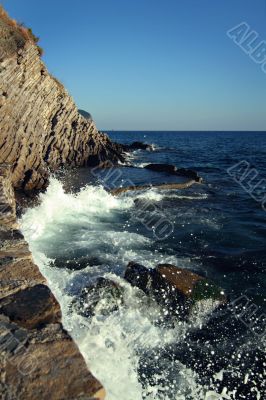 Sea-foam and rocks