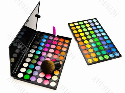 multicolored eye shadows and cosmetics brush