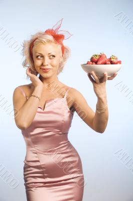 woman with bowl with strawberry woman with bowl with strawberry