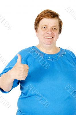 elderly woman is putting her thumb up on white