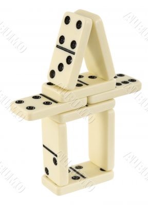 Tower constructed of dominoes bones