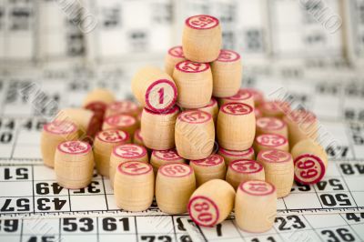 Wooden counters of bingo on cards