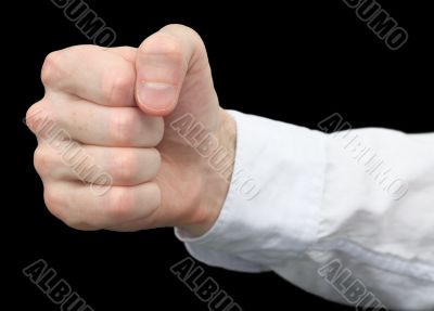 Fist it is isolated on a black background Fist it is isolated on a black background