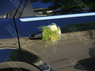 Wedding car decorated with flowers