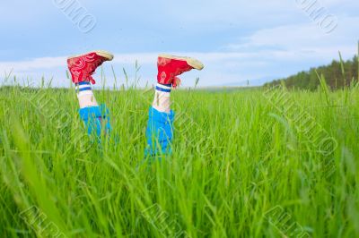 Feet in gym shoes and hungry mosquitoes Feet in gym shoes and hungry mosquitoes