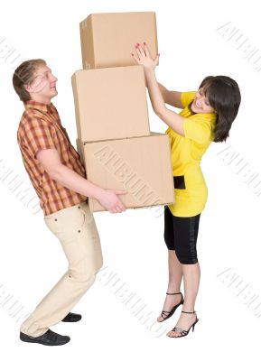 Girl loads the man with cardboard boxes Girl loads the man with cardboard boxes