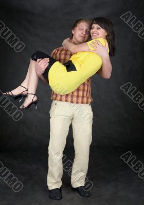 Man holds the girlfriend on hands Man holds the girlfriend on hands