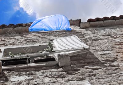 Blue curtain on wind