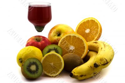 Fruits and glass with juice isolated on white background