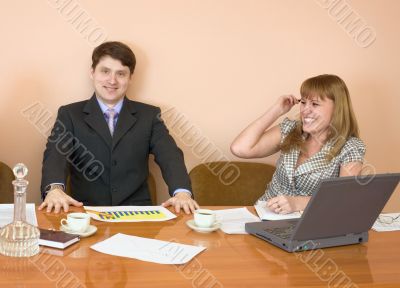 Business people sits at the table