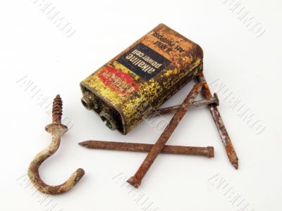 Rusty battery and nails