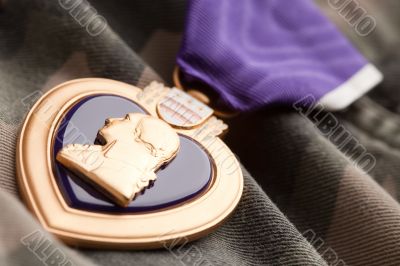 Purple Heart War Medal on Camouflage Material