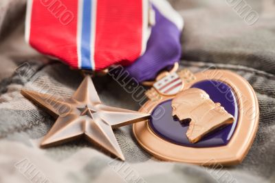 Bronze and Purple Heart Medals on Camouflage Material