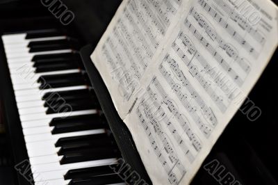 Piano, keys and music copy-book
