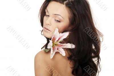 Beautiful portrait of a sexy woman with bright white flowers. Beautiful portrait of a sexy woman with bright white flowers.