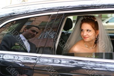 Bride with groom reflexion