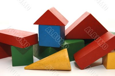 building from wooden colourful childrens blocks