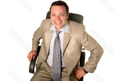 Young businessman sitting in chair