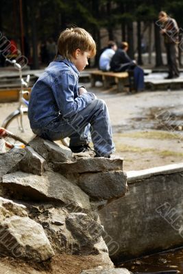 boy in jeans suit