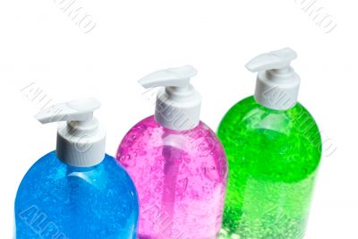 hair gel bottles over white