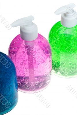 hair gel bottles over white