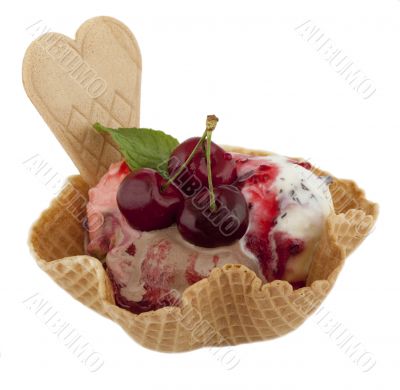 Fruit sundae with cherry on waffle