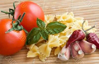 Tomatoes with raw pasta