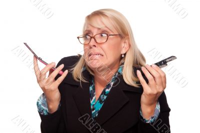 Frustrated Woman with Two Cell Phones