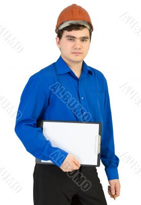 Young man in a helmet with a tablet