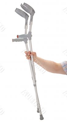 hand holding crutches