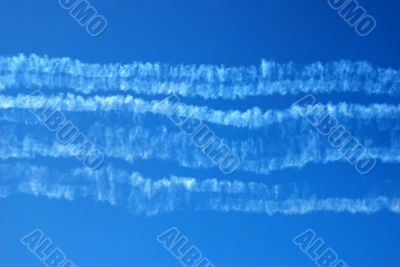 Smoke traces in blue sky