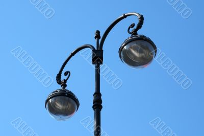 Vintage Street Lamp on Blue Background