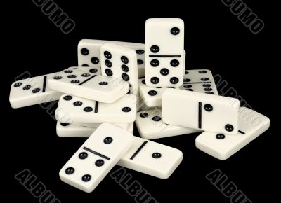 Heap of bones of dominoes on a black Heap of bones of dominoes on a black