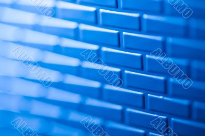 Wall of metallic bricks