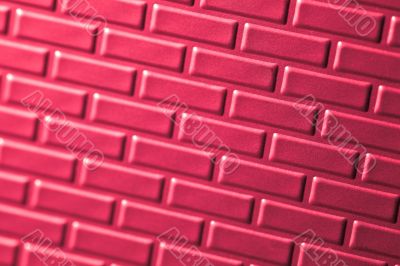 Wall of metallic bricks