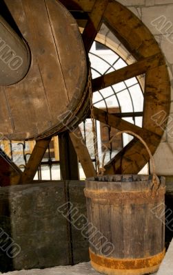 Old wooden well and bucket