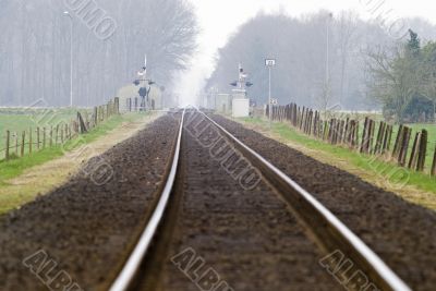 Railtrack with hazy crossing.
