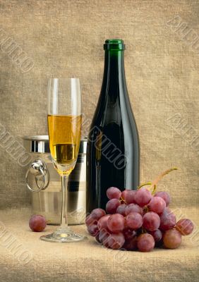 Still-life with champagne wine and grapes