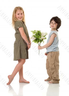 Two children with flowers Two children with flowers