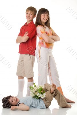 Three children with flowers