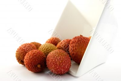 Lychee Spilling out of a Dish