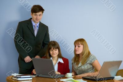 Girls at a desktop and their chief