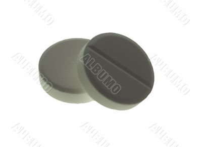 Two big medical tablets with the isolated background Two big medical tablets with the isolated background