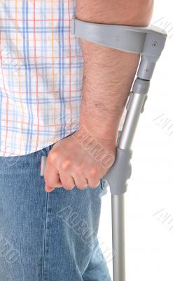 man walking with a crutch