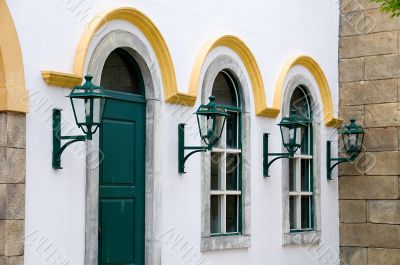 Facade of windows and antique lanterns