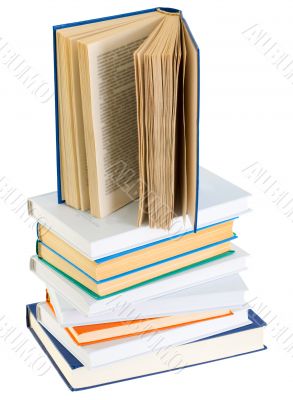 Pyramid from books with color covers on a white background